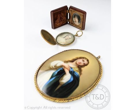 A Berlin style plaque, of oval form and enamelled with a portrait of a female figure in white robes with blue and yellow shaw
