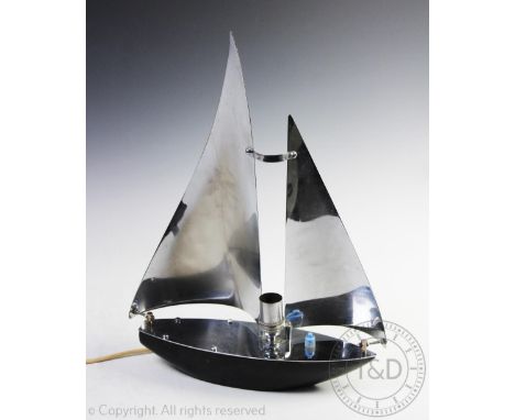 An Art Deco style lamp modelled as a sailing boat, modelled with a painted black hull and chromed sails, 47cm high    CONDITI
