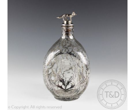 A Haig's Whisky white metal overlay dimple decanter, signed 'Nice, France' to underside, with associated fox stopper, 23cm hi