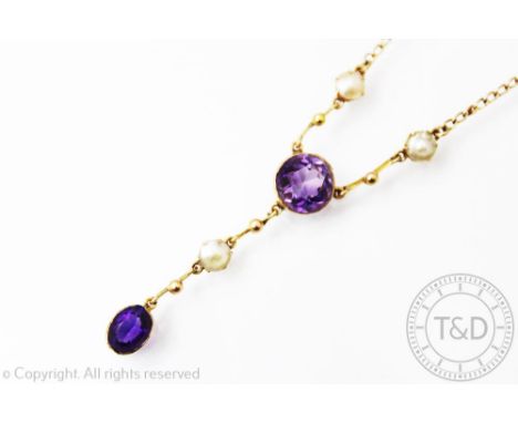 An Edwardian amethyst and split seed pearl set lavalier necklace, designed as a pearl set chain with central amethyst, suspen