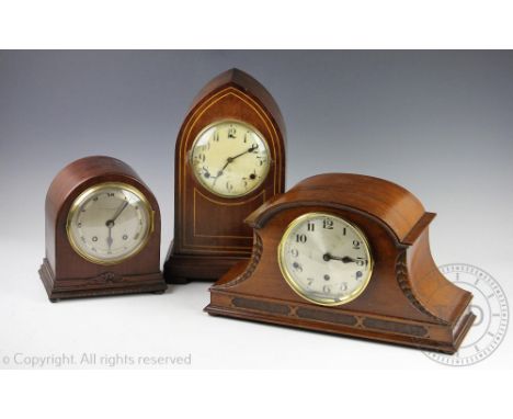 An Edwardian mahogany lancet shaped clock by WM.L.Gilbert Clock Co, 37cm and two further mantel clocks (3)