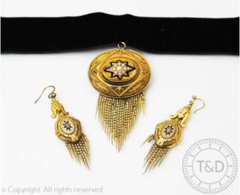 A suite of Victorian jewellery, earrings and brooch circa 1880, each designed as an oval panel with blue enamelled star desig