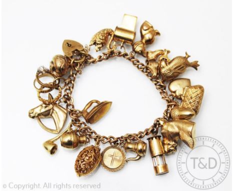 A 9ct yellow gold curb link bracelet hung with numerous charms, to include; a horse, parrot, acorn, an egg enclosing a bird e