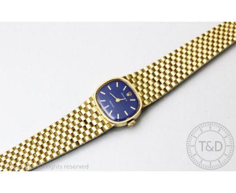 A ladies 14ct gold 'Rolex Precision' wristwatch, the cushion shaped case enclosing blue enamelled cushion shaped dial with wh