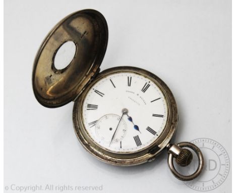 A Victorian silver half hunter pocket watch Chester 1888, white enamel dial with black Roman numerals signed 'Cooke & Kelvey,