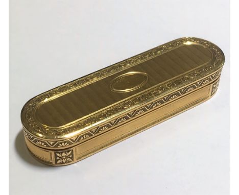 An early 19th century 18ct gold tooth pick box, of rounded rectangular form, with engine turned detailing and foliate borders