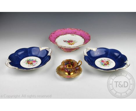 A Royal Worcester florally painted teacup and saucer, signed 'E.Barrer' (saucer 12cm diameter) and 'Freeman' (cup 6.5cm high)