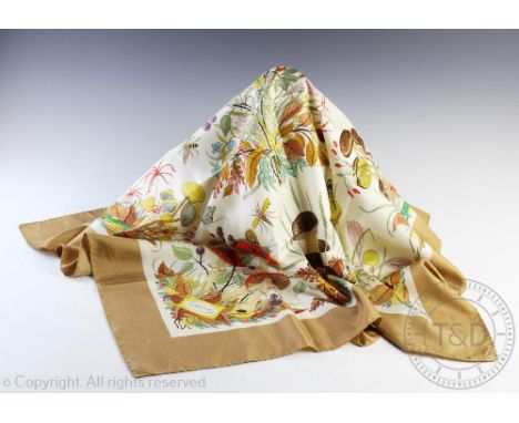 A Gucci scarf designed by V Accornero, decorated with flora and fauna, 86cm wide   CONDITION REPORT:  one thread pulled. Slig