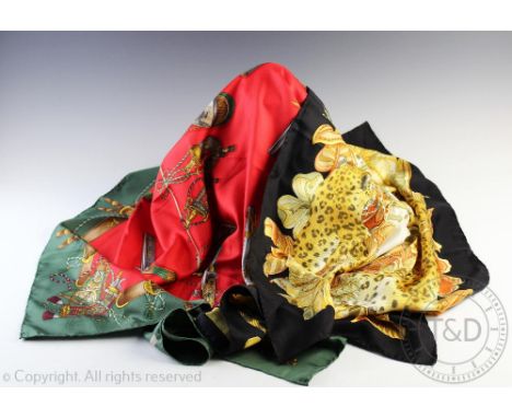 A Gucci scarf, decorated with pistols and shot flasks, 86cm wide and a Salvatore Ferragamo scarf (2)   CONDITION REPORT:  Sal