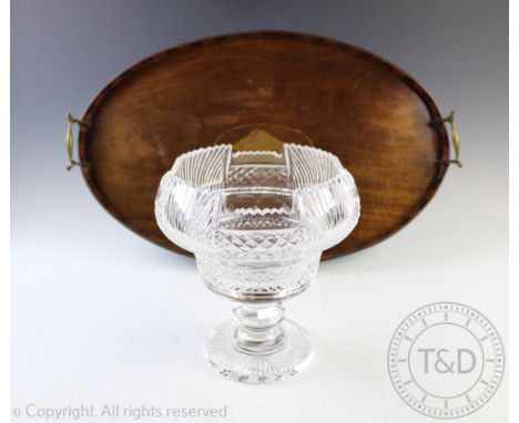 A late 19th/early 20th century cut glass pedestal bowl, the faceted bowl with notched rim and diamond cut detailing raised on