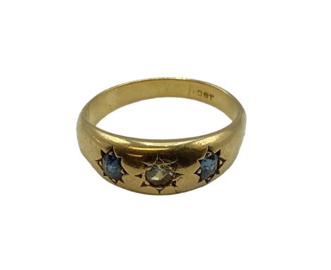 An 18ct gold sapphire and diamond hoop ring. With star set diamond and sapphire accents. Size O. 3.6g. 