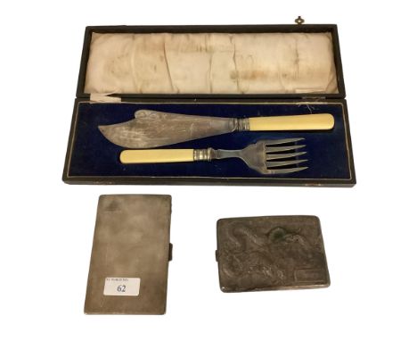 A cased fish knife and fork, a hallmarked silver cigarette case, and another cigarette case, all as found with some wear 