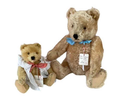 Two original Steiff bears, to include 42cm Blonde, 1950s with button, and a 25cm Blonde in a dress, with button, 1959-1966. c