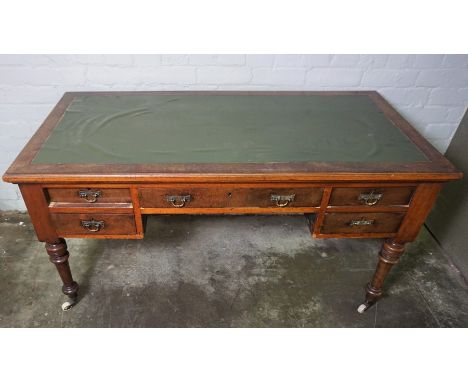 Stained Wood Kneehole Desk, circa late 19th / early 20th century, Having Fitted Drawers, Raised on Ceramic Castors, 75cm high