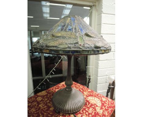 A 20th century cast table lamp having Tiffany style coloured glass shade depicting Dragonflies 