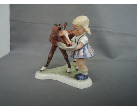 A Goebel/Hummel study, Girl feeding foal