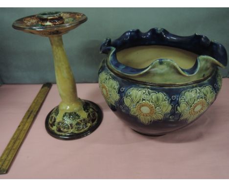A Royal Doulton stoneware candlestick having glazed foliate decoration and a similar Royal Doulton jardiniere