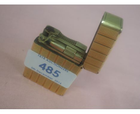 A vintage French Dupont gold plated lighter, stamped AJF '67