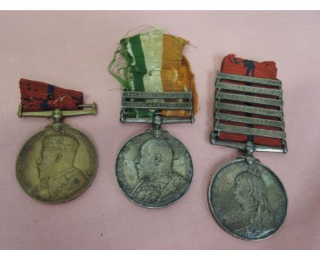 A trio of medals, Queens South Africa medal with six bars, Kings South Africa medal 1901-1902 bars to 663 Pte J R Barnes Scot