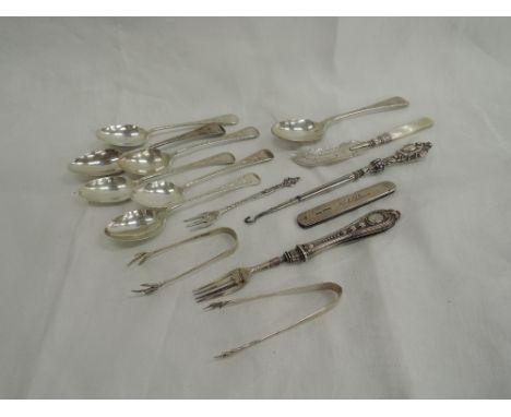 A small selection  of HM silver including an 18th century Georgian silver teaspoon, five teaspoons having bright cut decorati