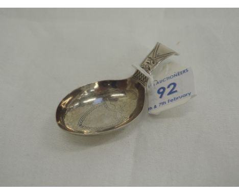 A Georgian silver caddy spoon having ovoid shaped bowl with bright cut decoration, Birmingham 1803, Cocks & Bettridge