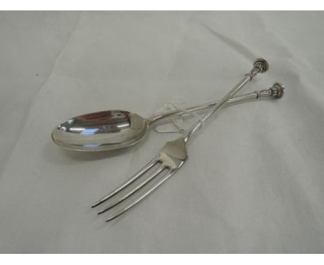 A Victorian silver spoon and fork having moulded flat topped terminals, London 1898, Holland, Aldwinkle & Slater