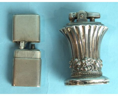 A silver "The Howitt Lighter", with engine-turned decoration, Sheffield 1944, 6cm and a Ronson "Newport" plated lighter, (2).