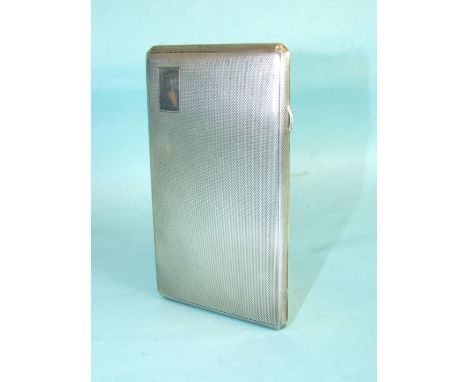 A rectangular engine-turned cigarette case, 14.5 x 8.5cm, Birmingham 1945, ___7oz.