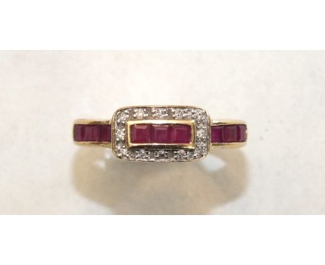 A ruby and diamond ring channel-set a line of square ruby baguettes, with 8/8-cut diamond-set 'buckle', in 9ct yellow gold mo