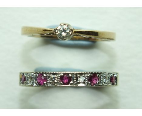 A ruby and diamond half-eternity ring in 9ct gold mount, size M, 2g and a 9ct gold solitaire diamond ring, size K, 1.6g, (2).