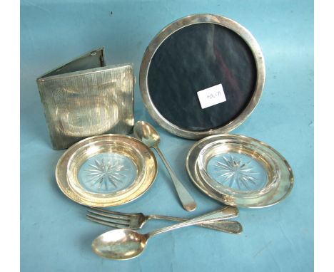 A silver circular photograph frame of plain form, 12.5cm diameter, Birmingham 1919, an engine-turned cigarette case, 8.5 x 9.