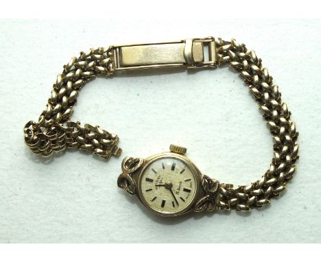 Rotary, a ladies 9ct gold wrist watch on 9ct gold chain bracelet, 13.8g, (bracelet a/f).