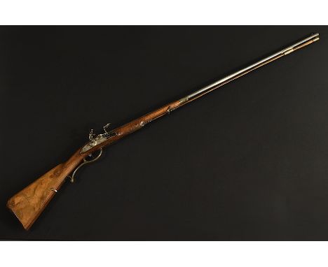 Steinschlossflinte. Gebläuter Rundlauf Kal. 11 mm. Oberseite mit zwei parallel verlaufend erhabenen Linien, in Höhe der Kamme