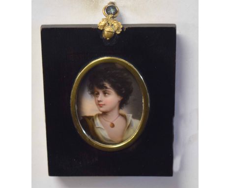 Continental porcelain plaque, probably Berlin, Head and shoulders portrait of a young boy wearing pendant, 8 x 6cm