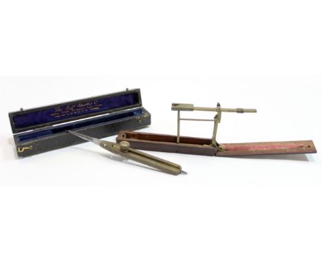 Wooden calibrated tool for measuring coinage and a further calibrated tool made by the Self-Starter Company of Tottenham Cour
