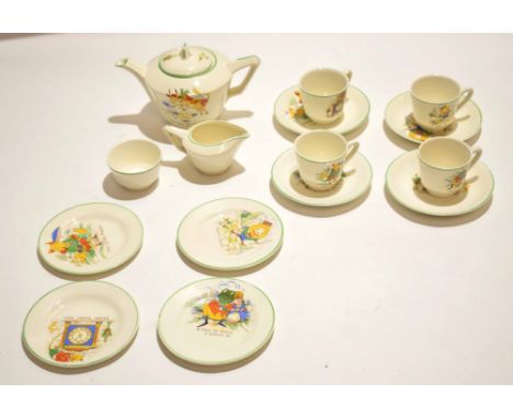 1930s Staffordshire tea set decorated with various nursery rhymes, the tea pot with "The Cow Jumped over the Moon" and others