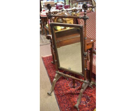 19th century mahogany cheval mirror of small proportions, ring turned frame and splayed legs with casters, 140cm high
