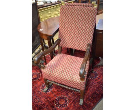 Pair of 18th century walnut throne type carver chairs, upholstered in geometric red and green cruciform pattern, each with gi