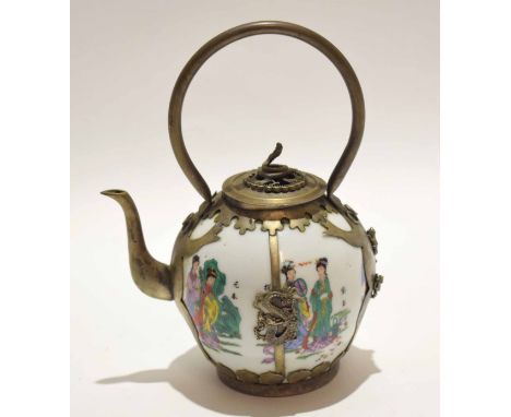 Chinese tea pot decorated in famille vert palette with Chinese figures, the tea pot with white metal mounts, the cover with a