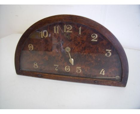 Early 20th C burr wood half moon shaped mantel clock 