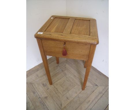 Small light oak sewing box on square supports with hinged top revealing fitted interior (45cm x 41cm x 70cm) 