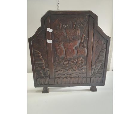 A antique carved oak wooden fire screen depicting a galleon, 66x61cm, shipping unavailable