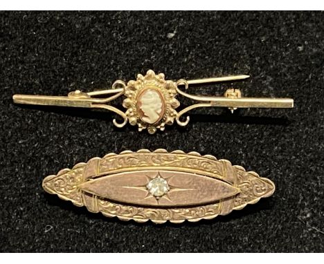 Two yellow metal vintage brooches