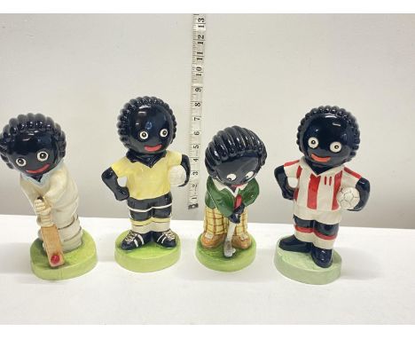 Four rare carltonware sport related ceramic figures, tallest 24cm