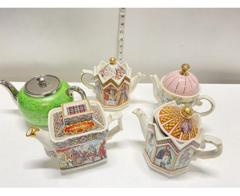 Four collectible Sadler teapots and a green Sudlows teapot, shipping unavailable