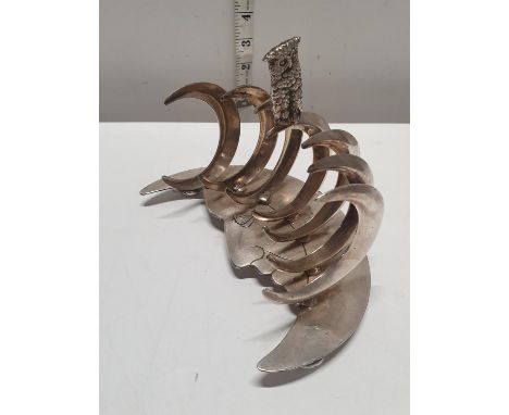 A unusual Art Deco period silver plated 'Man in the Moon' toast rack, with owl finial made by Pridham &amp; Sons Torquay