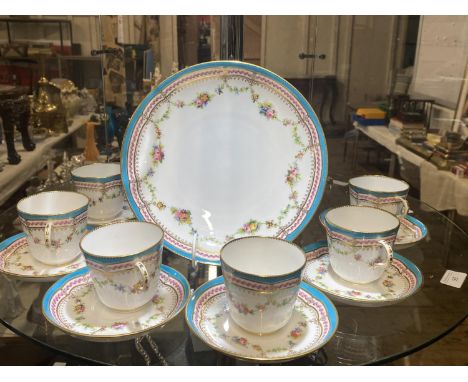 A set of six late 19th Century Minton porcelain cups and saucers together with shallow dish. All hand painted with flower dec