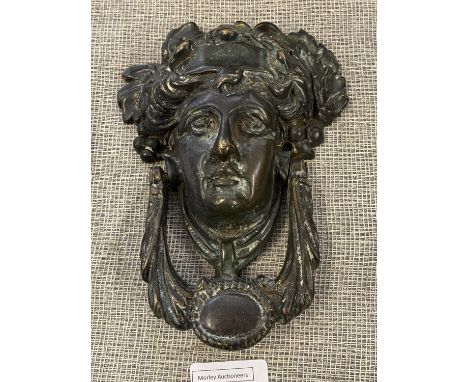 A heavy Victorian bronze door knocker 20cm