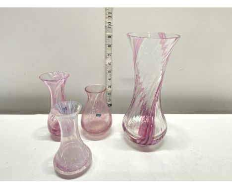A selection of pink art glass vases, two being Caithness, larger h24cm, shipping unavailable