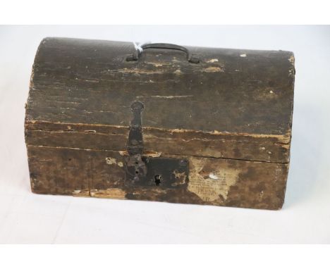 Antique box in the form of a dome topped trunk 